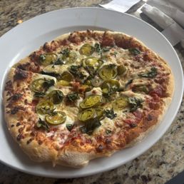 We got a small pizza, olives and jalapeños, very nice size-- delicious! We got a small pizza, olives and jalapeños, very nice size-- delicious!