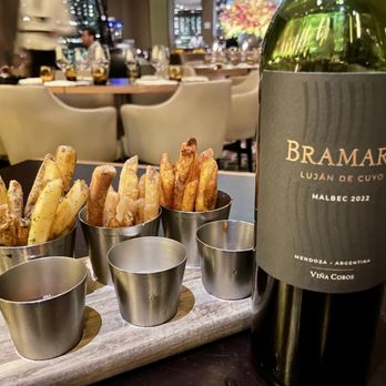 Bourbon Steak - Miami - Complementary fries with ketchup, chive, onion, dip, and barbecue sauce - Steakhouses Near Me - Aventura, Florida Bourbon Steak - Miami - Complementary fries with ketchup, chive, onion, dip, and barbecue sauce - Steakhouses Near Me - Aventura, Florida