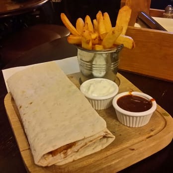 Ye Olde Trip To Jerusalem - Flat-bed sandwich with pulled pork, fries, ketchup and sour cream. - Pubs Near Me - Nottingham, NGM Ye Olde Trip To Jerusalem - Flat-bed sandwich with pulled pork, fries, ketchup and sour cream. - Pubs Near Me - Nottingham, NGM