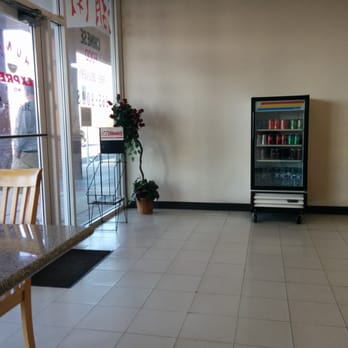 Hunan Express - One if two tables. This place is really made for takeaway. - Chinese Near Me - Taylorsville, Utah