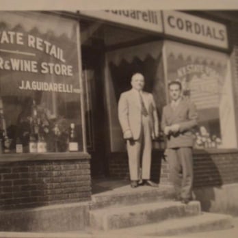 Guidarelli's Liquor Store - two men standing outside - Beer, Wine & Spirits Near Me - Schenectady, New York