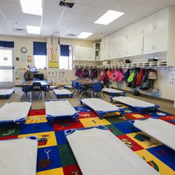 Red Rocks Christian Preschool - The 3-year-old classroom set up for naptime.