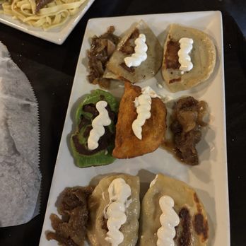 Pierogi Mountain - One of each kind served. The chile verde one was amazing! - Polish Near Me - Columbus, Ohio Pierogi Mountain - One of each kind served. The chile verde one was amazing! - Polish Near Me - Columbus, Ohio