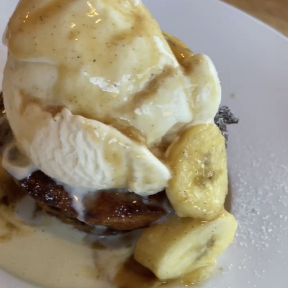 Wind & Waves Grill - Bananas foster bread pudding with rum-caramel sauce - Cocktail Bars Near Me - Vero Beach, Florida Wind & Waves Grill - Bananas foster bread pudding with rum-caramel sauce - Cocktail Bars Near Me - Vero Beach, Florida