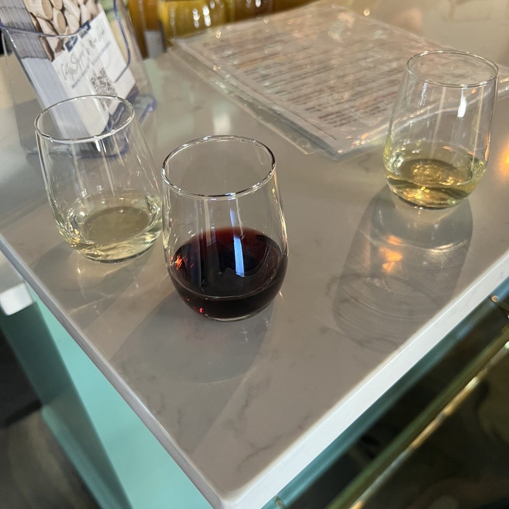Charleston Wine Co - three glasses of wine on a table - Wine Tasting Room Near Me - Charleston, South Carolina Charleston Wine Co - three glasses of wine on a table - Wine Tasting Room Near Me - Charleston, South Carolina