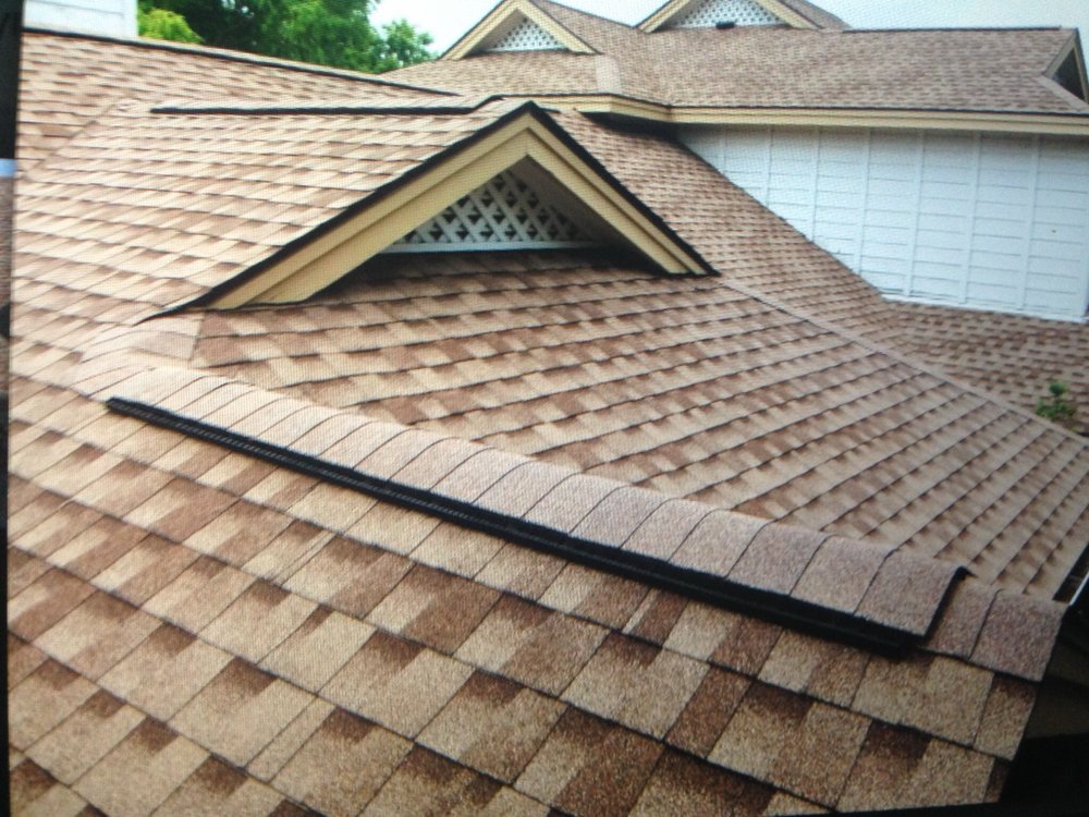 Slide of Michiel Roofing