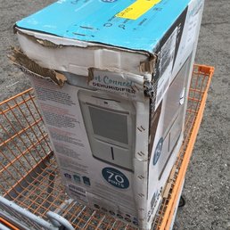 Top of box ripped open and side of box crushed in. Top of box ripped open and side of box crushed in.