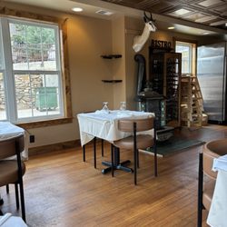 Dining room, look at that woodstove!