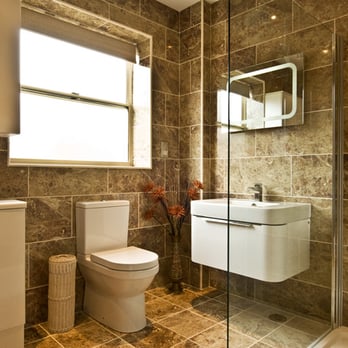 Builderzz Inc - a bathroom with a toilet, sink, and shower - General Contractors Near Me - Los Angeles, California