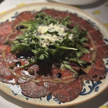 Lemonica - Prime Beef Carpaccio with Arugula and Parmesan - Wine Bars Near Me - Hollywood, Florida Lemonica - Prime Beef Carpaccio with Arugula and Parmesan - Wine Bars Near Me - Hollywood, Florida