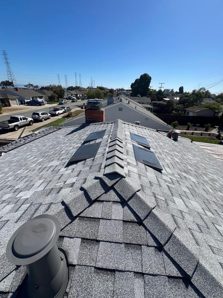 Slide of Alpha Roofing Group