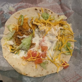 Taco Bell - How do you make 3 tacos and put a pinch of meat. Not even a small line. At this point I have a sour cream taco. - Tacos Near Me - Moreno Valley, California