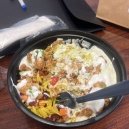 Chicken shawarma (meat only), Urban Rice, dried cranberry, feta, tomatoes, cucumber and garlic sauce Chicken shawarma (meat only), Urban Rice, dried cranberry, feta, tomatoes, cucumber and garlic sauce