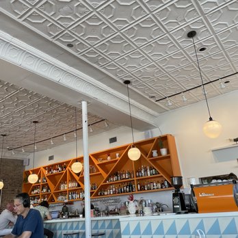Halcyon - people sitting at a table in a restaurant - Breakfast & Brunch Near Me - Dallas, Texas