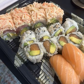 Fusion Sushi - Rocky Mountain Roll (left), Salmon Avocado Roll (middle), Salmon Nigiri (right) - Sushi Bars Near Me - Jacksonville, Florida