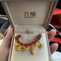Luk Fook - Charm bracelet
