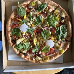 Okay 7.5 spinach leaves for $2.00 hardly seems right especially since they didn't add the green peppers! $32.00 pizza sad!