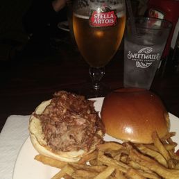 Pulled pork sandwich and Stella Artois Pulled pork sandwich and Stella Artois