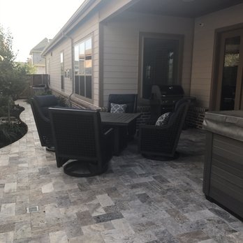 Elite Outdoor Living - a patio with chairs and a hot tub - Landscaping Near Me - Frisco, Texas Elite Outdoor Living - a patio with chairs and a hot tub - Landscaping Near Me - Frisco, Texas