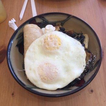 Main Kitchen Cafe - Huevos Rancheros. They are delicious some of the potatoes could have been a little longer for my taste but over all great job - New American Near Me - Granada Hills, California