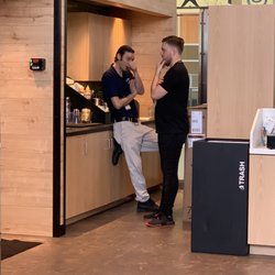Servers chatting without trying to help customers