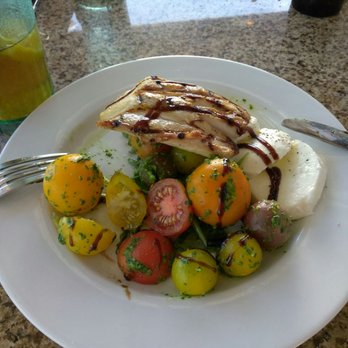 The Mansion - Caprese salad with grilled mahi (fish of the day). - New American Near Me - Melbourne, Florida The Mansion - Caprese salad with grilled mahi (fish of the day). - New American Near Me - Melbourne, Florida