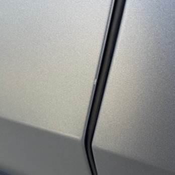 Bob Smith BMW - Paint chip that looks like a bright star on a dark night sky - Car Dealers Near Me - Calabasas, California