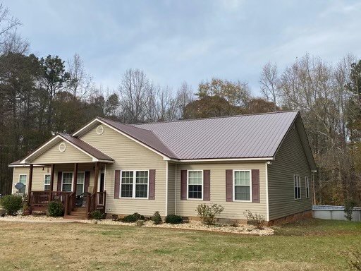 Slide of Quiroz Metal Roofing