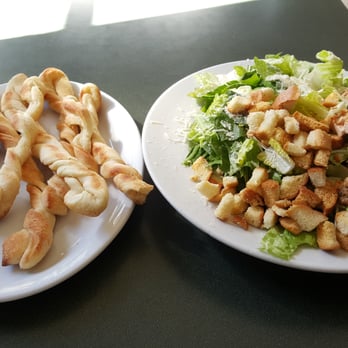 Taffy's Pizza - chicken ceasar salad comes with free fresh baked breadsticks and house made ceasar dressing ! - Pizza Near Me - Santa Barbara, California Taffy's Pizza - chicken ceasar salad comes with free fresh baked breadsticks and house made ceasar dressing ! - Pizza Near Me - Santa Barbara, California