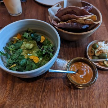 Damian - Guacamole with mole, olives and cauliflower and corn tostadas. - Mexican Near Me - Los Angeles, California