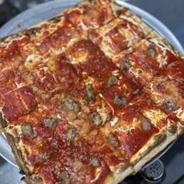 Upside down Sicilian with half sausage. Upside down Sicilian with half sausage.