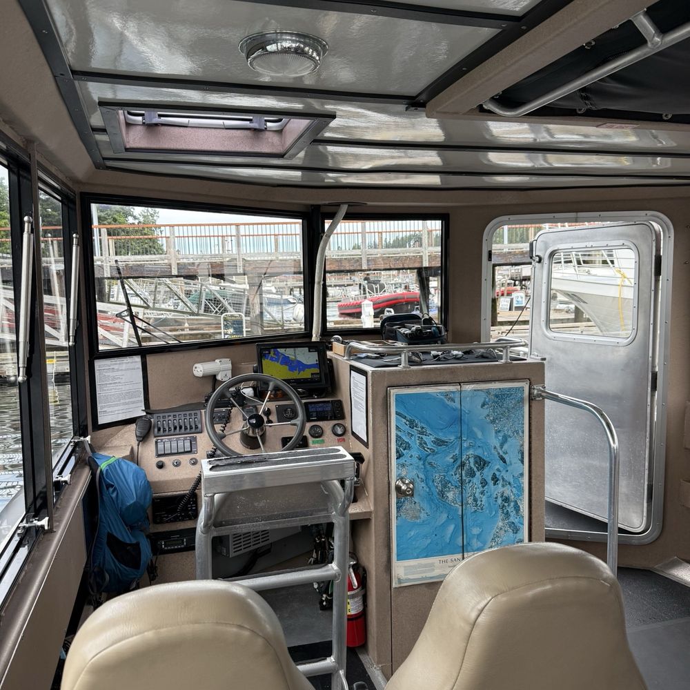 Maya's Legacy Whale Watching - Interior of boat (toilet behind map) - Whale Watching Tours Near Me - Friday Harbor, Washington Maya's Legacy Whale Watching - Interior of boat (toilet behind map) - Whale Watching Tours Near Me - Friday Harbor, Washington
