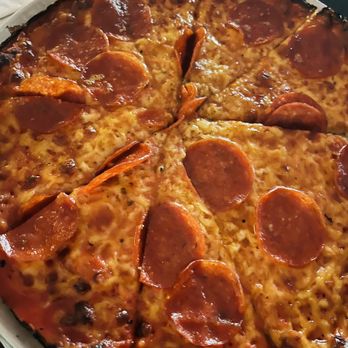 Poopsie's - a pepperoni pizza on a plate - Sports Bars Near Me - Pembroke, Massachusetts