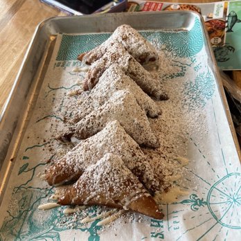 Mr. Shrimp Cajun Kitchen - Beginet with powder sugar drizzled with vanilla sugar - Cajun/Creole Near Me - Pompano Beach, Florida Mr. Shrimp Cajun Kitchen - Beginet with powder sugar drizzled with vanilla sugar - Cajun/Creole Near Me - Pompano Beach, Florida