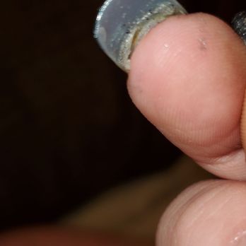 Cute Nail - I know this is a blurry photo but there's glue residue under this nail. - Nail Salons Near Me - Gun Barrel City, Texas
