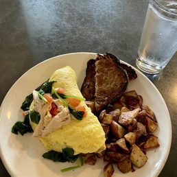 3 egg Design Your Omelet with chicken, spinach and tomatoes.
