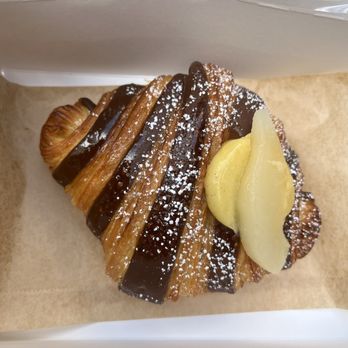 Little French Bakery - Chocolate pear croissant with a light pear custard inside - Bakeries Near Me - Manhattan Beach, California Little French Bakery - Chocolate pear croissant with a light pear custard inside - Bakeries Near Me - Manhattan Beach, California
