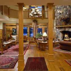 The Fern Lodge - The Lodge's Great Room with cathedral ceilings and river rock fireplace is a popular gather spot for the guests.