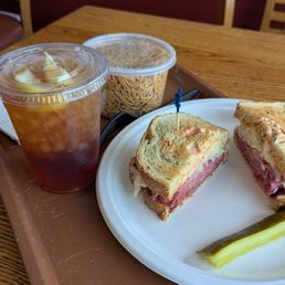 Reuben on griddled rye, pint of sesame noodles, and tea Reuben on griddled rye, pint of sesame noodles, and tea