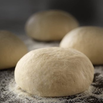 Marco's Pizza - dough on a table - Pizza Near Me - Cedar Hill, Texas Marco's Pizza - dough on a table - Pizza Near Me - Cedar Hill, Texas