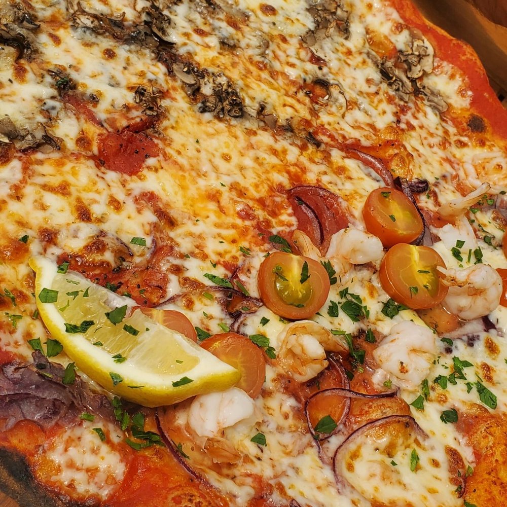 Half fungi di Bosco and half garlic prawn Half fungi di Bosco and half garlic prawn