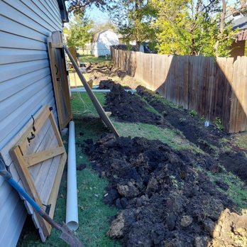 GroundScape Solutions - Laying the pipes - Landscaping Near Me - Haltom City, Texas