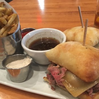 Larsen's Grill - Prime Roast Beef Dip.  Sliced roast beef on a garlic parmesan ciabatta with creamed horseradish and au jus for dipping.  Great sandwich! - Steakhouses Near Me - Oxnard, California