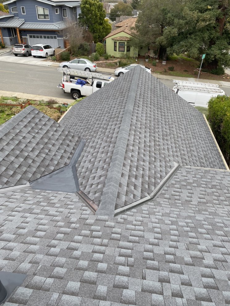 Slide of Mel's Roofing