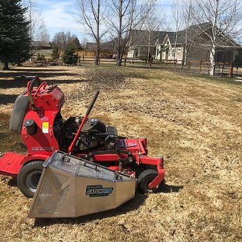 Leo Property Care - a red lawn mower in a yard - Lawn Services Near Me Leo Property Care - a red lawn mower in a yard - Lawn Services Near Me