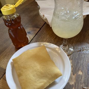 Maria's New Mexican Kitchen - sopapilla with honey. Yummmmmm. - New Mexican Cuisine Near Me - Santa Fe, New Mexico Maria's New Mexican Kitchen - sopapilla with honey. Yummmmmm. - New Mexican Cuisine Near Me - Santa Fe, New Mexico