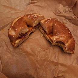 Pretzel bacon, egg, and cheddar sandwich.
