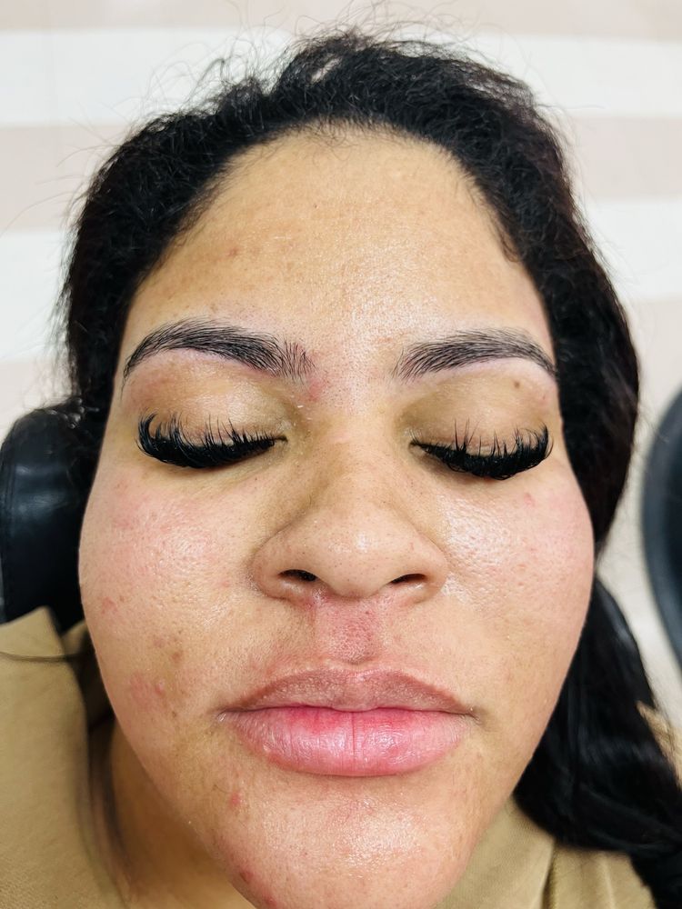 Eyebrow Threading In Haillie's Haircuts Logo