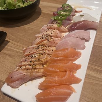 Eat's Ayce Sushi - Left: Peppered salmon, peppered tuna Right: salmon, yellowtail, albacore, squid - Japanese Near Me - Alhambra, California Eat's Ayce Sushi - Left: Peppered salmon, peppered tuna Right: salmon, yellowtail, albacore, squid - Japanese Near Me - Alhambra, California