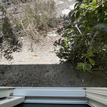 NextDoor Construction & Remodeling - Sliding door to courtyard with loose dirt and wood chips - General Contractors Near Me - Los Angeles, California